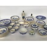 A quantity of blue and white china including Willow pattern, Delft,