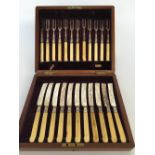 A Lee & Wigfull canteen consisting of twelve forks and eleven knifes with Ivory handles,