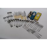 A large quantity of flatware including some silver plated items