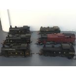 A Hornby 00 Gauge Locomotive LMS 6924 in black, a Tri-ang 00 Gauge Locomotive LMS 163 in maroon,