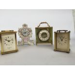 A selection of 4 carriage quartz clocks from various maker such as Precista,