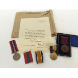 A National Fire Brigade Union Medal for long service awarded to Arthur Hutchings 1125/1126,