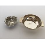 Two small trinket dishes in silver, one in a heart shape of repousse design 0.