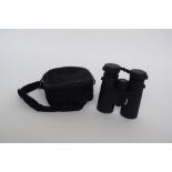 A pair of Viking Navilux 10 x 42 binoculars in case