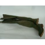 A pair of vintage Hunter Kingfisher waders with studded soles,