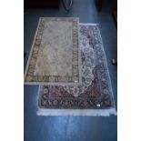 A Persian rug together with a John Lewis rug 170cmL and 120cmL