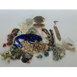 A selection of costume jewellery mainly necklaces, earrings, bracelets, charms,