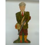 A Mandy Learmonth stick and umbrella stand in the form of a man dressed for shooting with cartridge