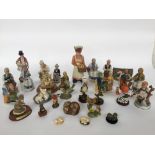 A selection of ceramic figurines of mainly birds and peoples some by Leonardo