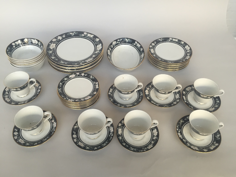 A Royal Doulton Vogue Collection Intrigue dinner service of 39 pieces including: eight dinner