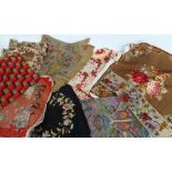 A large lot of antique and vintage cushion and seat covers, mostly fine embroidery and tapestry.