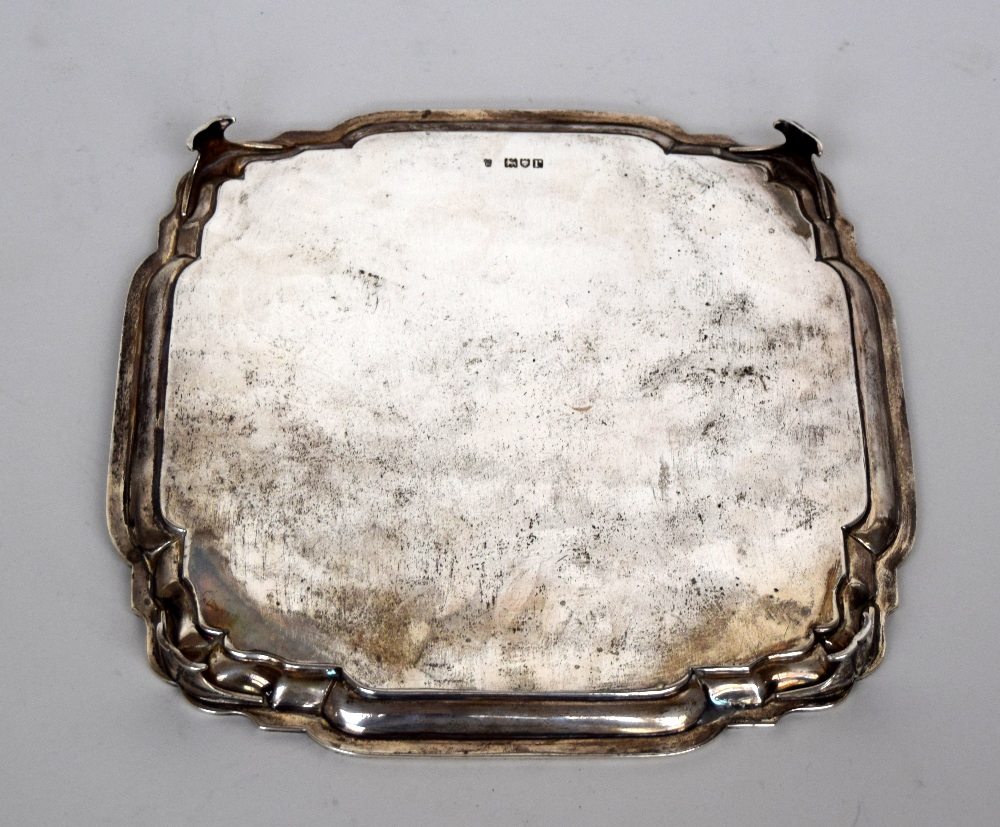 A George V silver salver raised on four feet by C.S. Harris & Sons Ltd London, 1932, 26.5cmW, 19. - Image 2 of 2