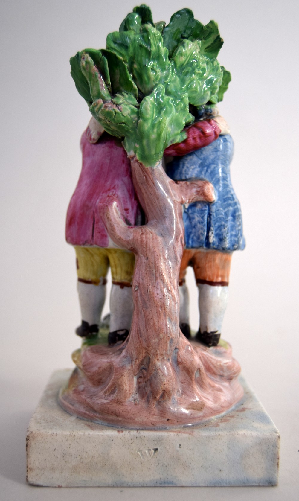 A George III pearlware 'Friendship' group by Walton of two two boys in front of a bocage a cat at - Image 2 of 2
