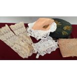 A selection of fine lace and cotton handkerchiefs and lace cuffs and trimmings.