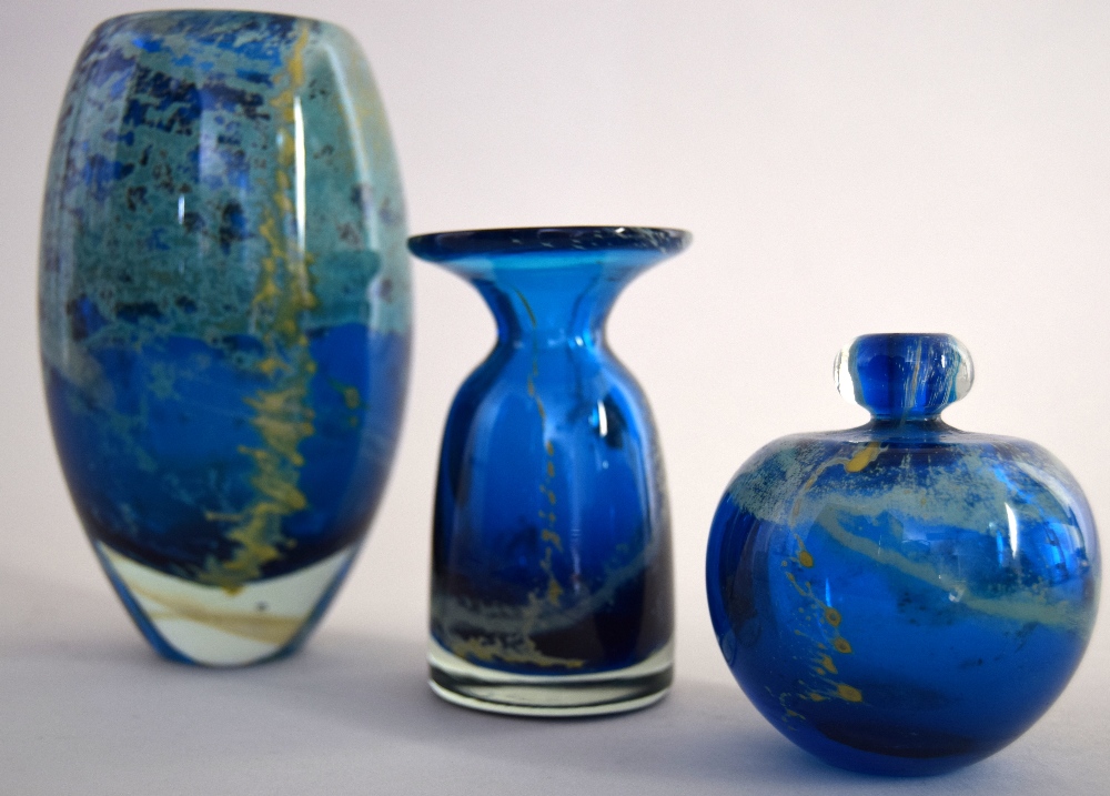 Three Mdina posy vases, some signed and with original labels, of blue,