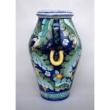 A large majolica baluster vase decorated with stylized birds and beasts in the Mannerist taste,