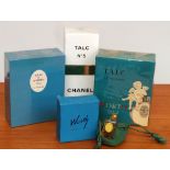 A selection of vintage perfumes and talcs - all unused and in original packaging.