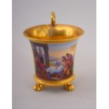 An Empire period porcelain cabinet cup in the manner of Vienna,