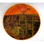 A Poole Pottery Studio plate attributed to Tony Morris, mid 1960's, green,