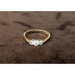 A 9ct gold ring with three zirconia