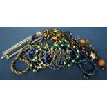 A quantity of costume jewellery mainly necklaces (8) with Venetian glass beads, malachite,