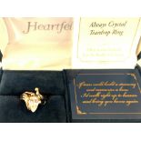 A 925 silver Always Crystal Teardrop Ring with certificate together with a heart shape locket with