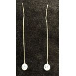 A pair of chain drop earrings with zirconia