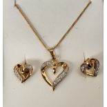 A 9ct set comprising of a chain and heart shape pendant with zirconia and a pair heart shape
