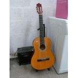 Encore ENC44 classical guitar with stand and Peavey practice amplifier