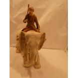 Royal Dux figure modelled as a man riding an elephant