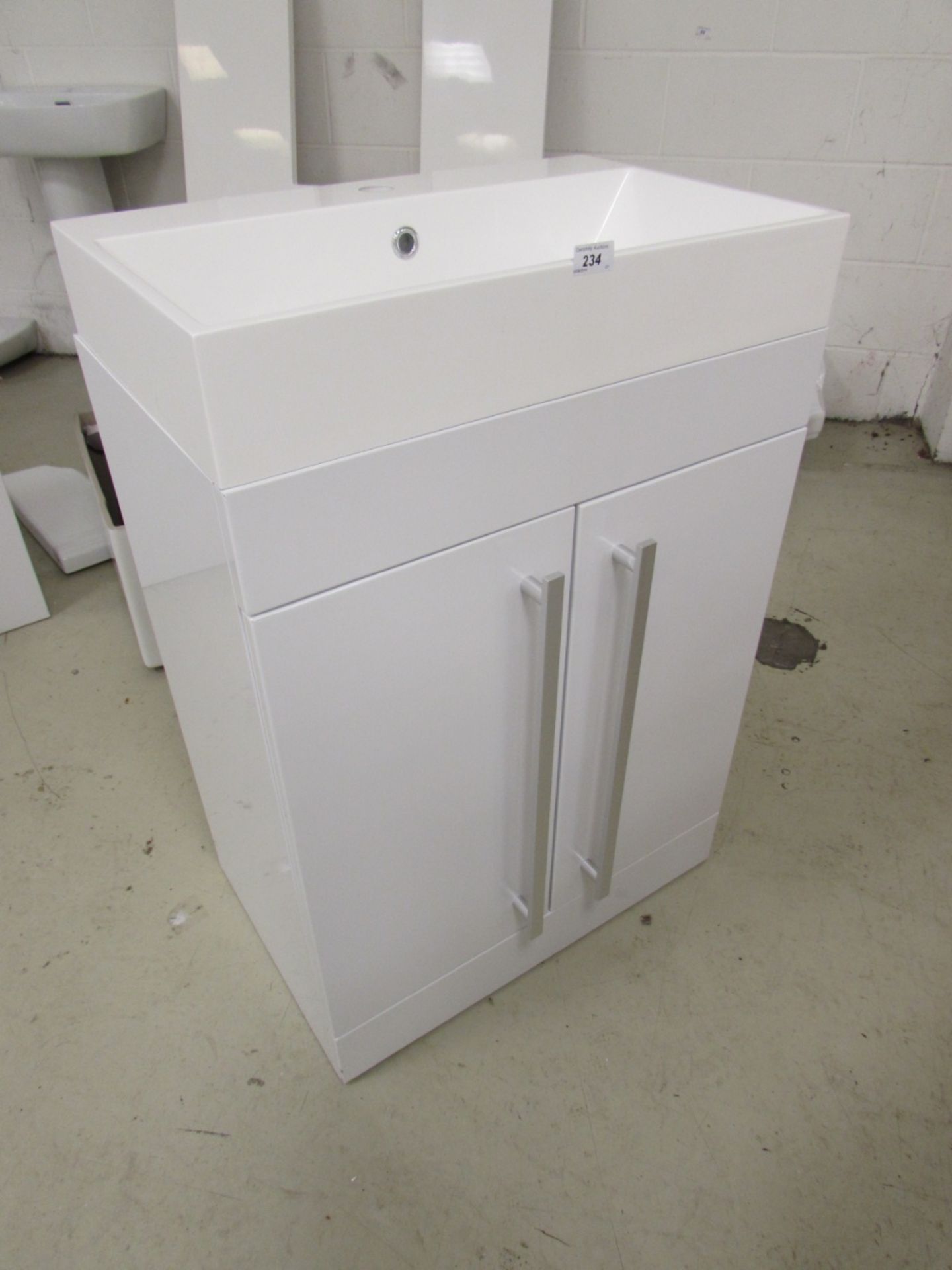600mm w designer gloss white vanity unit with twin soft close doors and slimline resin basin