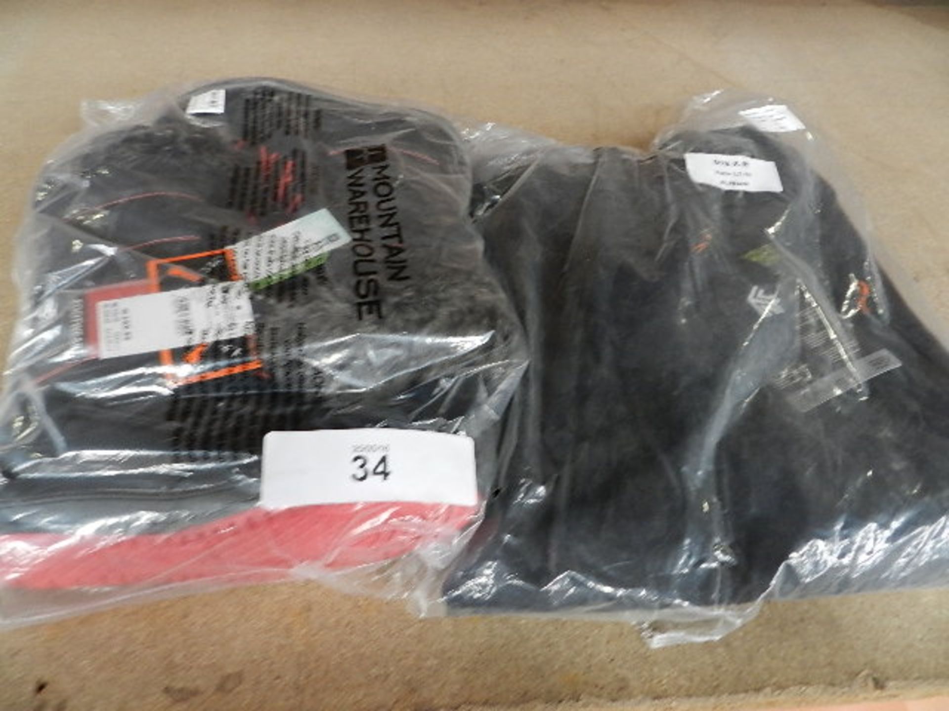 A pair of Polartec Vanir LT-16 trainers, size XL and a pair of Mountain Warehouse snow boots, UK