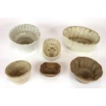 A collection of stoneware jelly moulds,