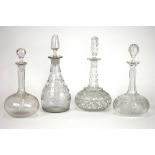 A pair of Edwardian cut glass decanters, compressed bowls engraved with fruiting vines,