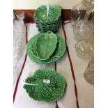 A quantity of various green glazed leaf plates