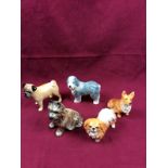 Five various Sylvac dog ornaments