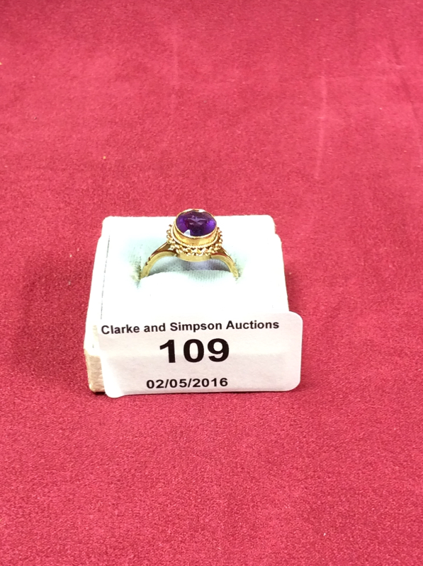A 9ct gold amethyst set ring