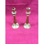 A pair of brass candlesticks