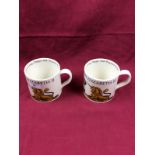 A pair of Queen Elizabeth II commemorative mugs