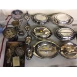 A quantity of various silver plated ware to include four sauce boats; entree dishes and covers;