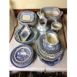 A quantity of various blue and white transfer printed dinnerware; a tureen; a jug etc.