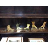 Two pairs of lady's brass buttoned shoes and two other similar