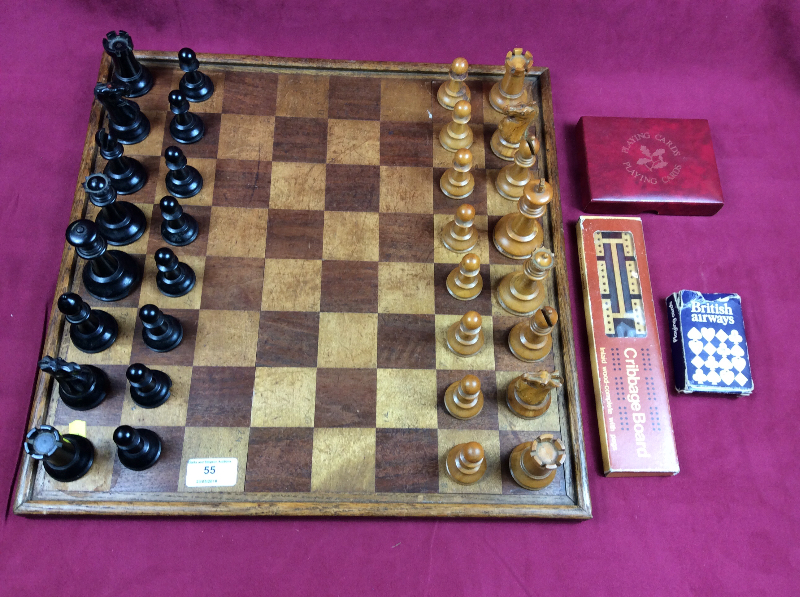 A Staunton patterned chess set (weighted) together with a chess board, a cribbage board,