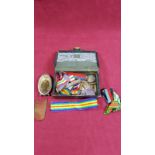 A tin of medal ribbons; a Naval photo; coins etc.