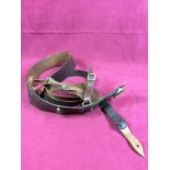 A Sam Browne leather army belt