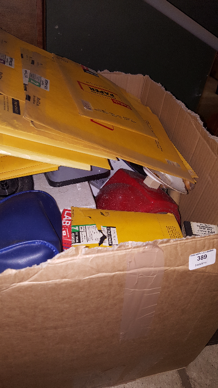 A box of various photographic related items and a storage tin of photography related books