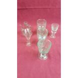 A quantity of various drinking glasses