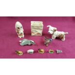 A box containing two Sylvac dogs; a Beswick chaffinch; Wade Whimsies; USSR badger etc.