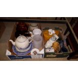 Two boxes containing teapots, storage jars, mugs etc.