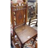 A Victorian oak hall chair